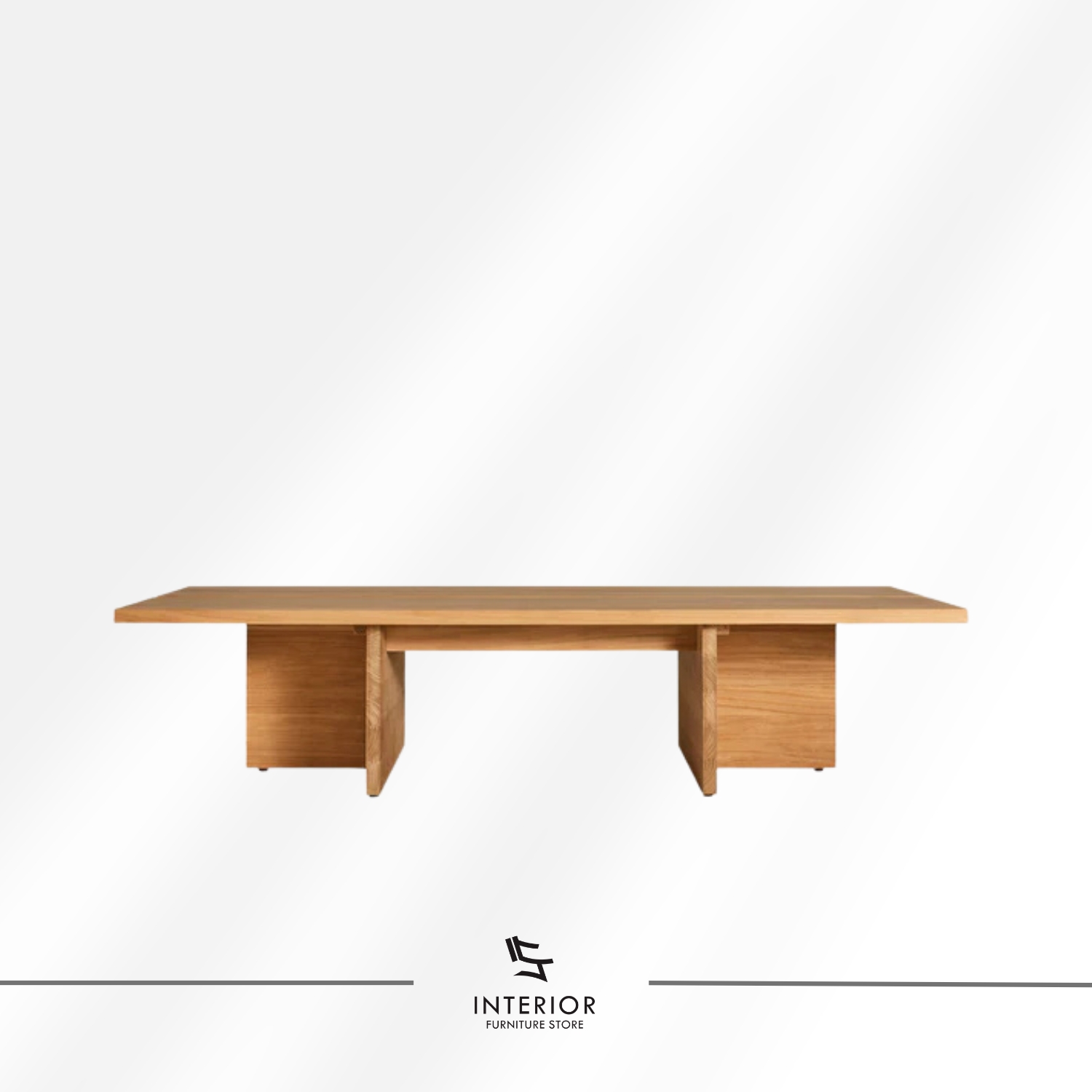 Solid wood coffee table with wide plank top and panel legs, modern minimalist design