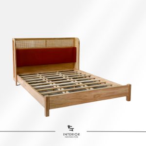 Wooden bed frame with woven rattan headboard and upholstered back panel in a natural finish.