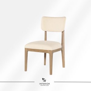 Modern upholstered dining chair with a solid wood frame and softly curved backrest.