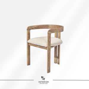 Wooden dining chair with a curved armrest frame and cushioned seat in light fabric.