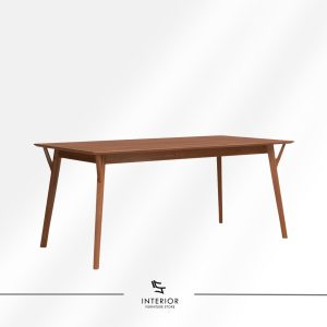 Modern solid wood dining table with a slim rectangular top, tapered legs, and distinctive angled support details.