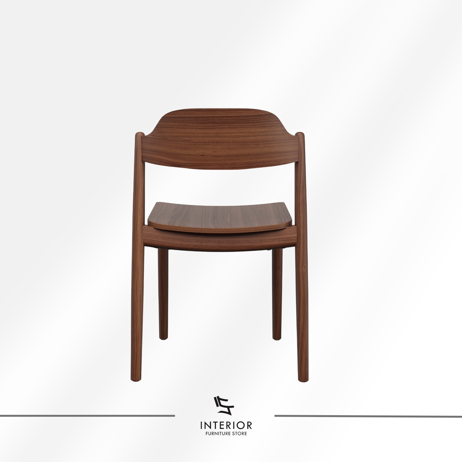 Solid wood dining chair with a minimalist silhouette, gently curved backrest, and rich walnut finish.