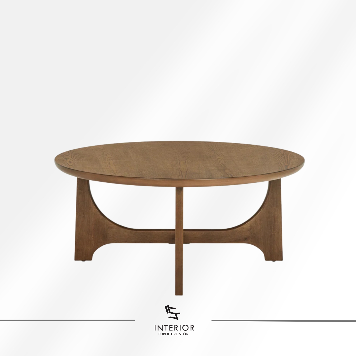Anala round wooden coffee table with sculptural curved base design