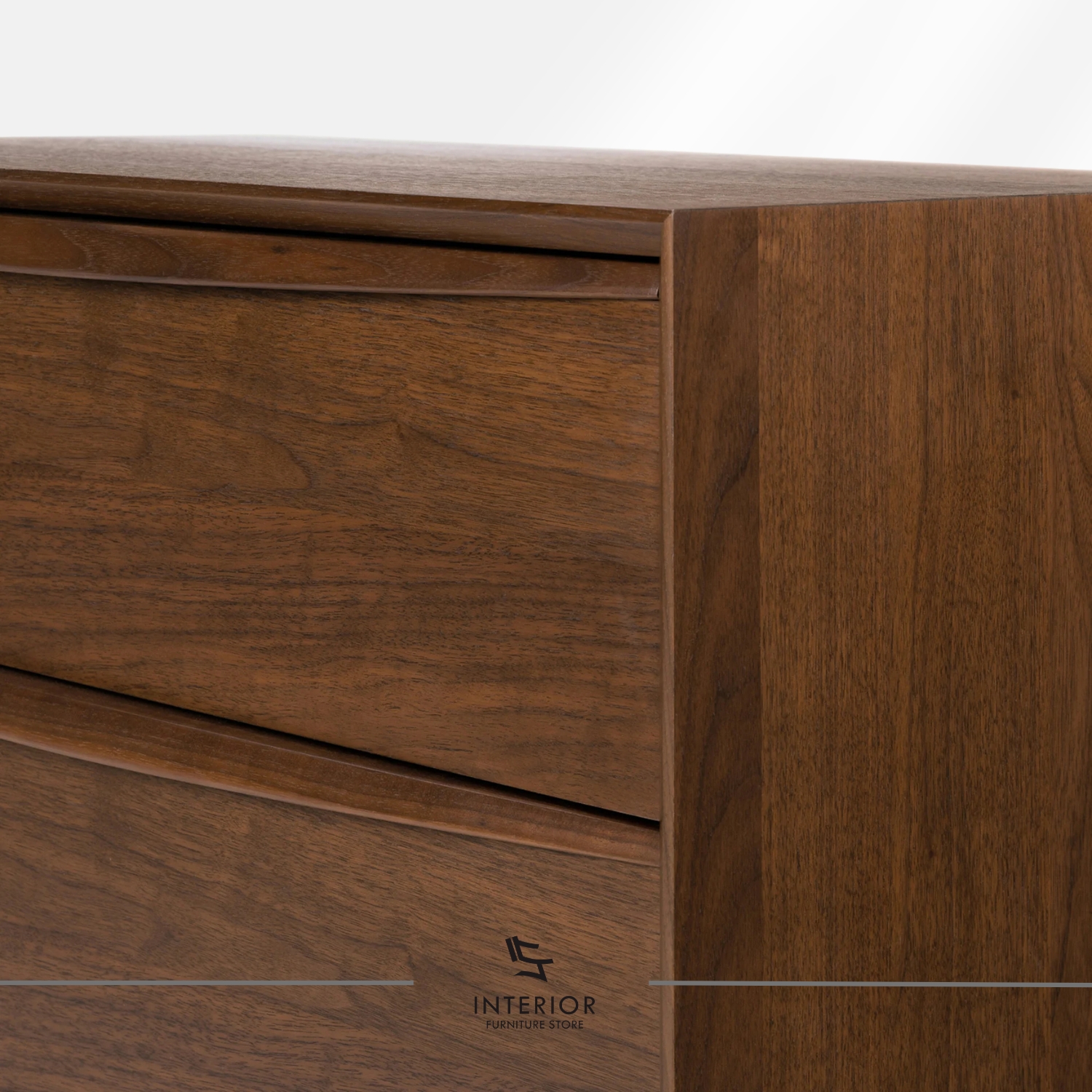 Mid-century modern wooden chest of drawers with four spacious drawers, tapered legs, and a rich walnut finish.