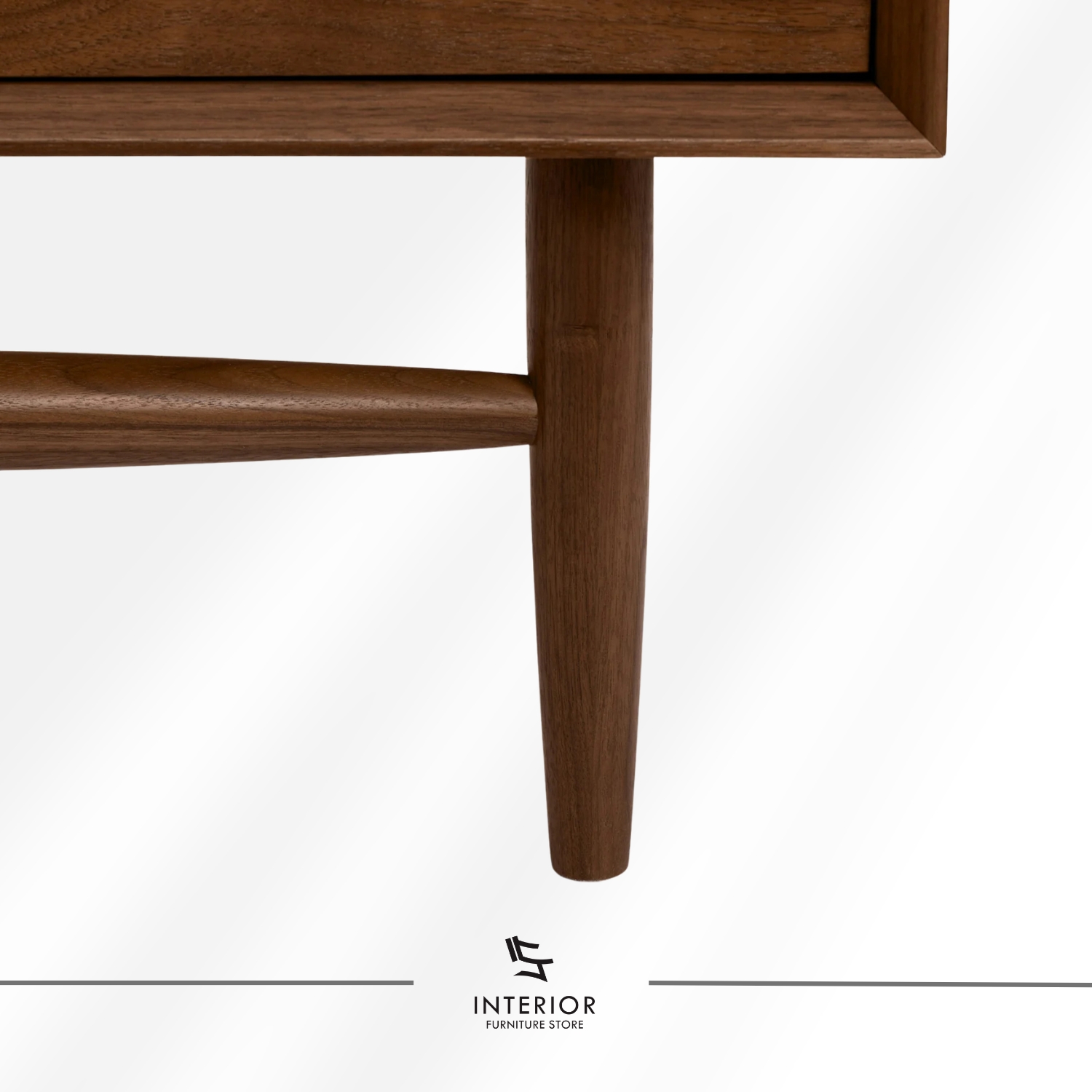 Mid-century modern wooden chest of drawers with four spacious drawers, tapered legs, and a rich walnut finish.