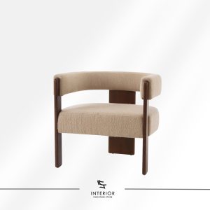 A modern armchair with a curved upholstered backrest and seat in soft beige fabric, supported by a dark wooden frame with clean lines.
