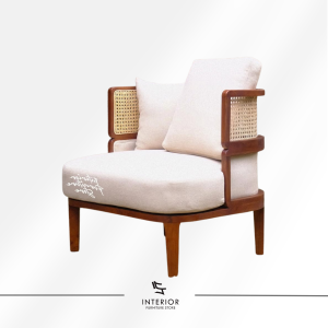 Adhikara cane lounge chair with upholstered cushions and solid wood frame