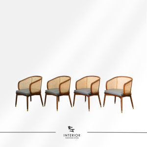 Arindra cane dining chair with cushioned seat pad and solid wood frame
