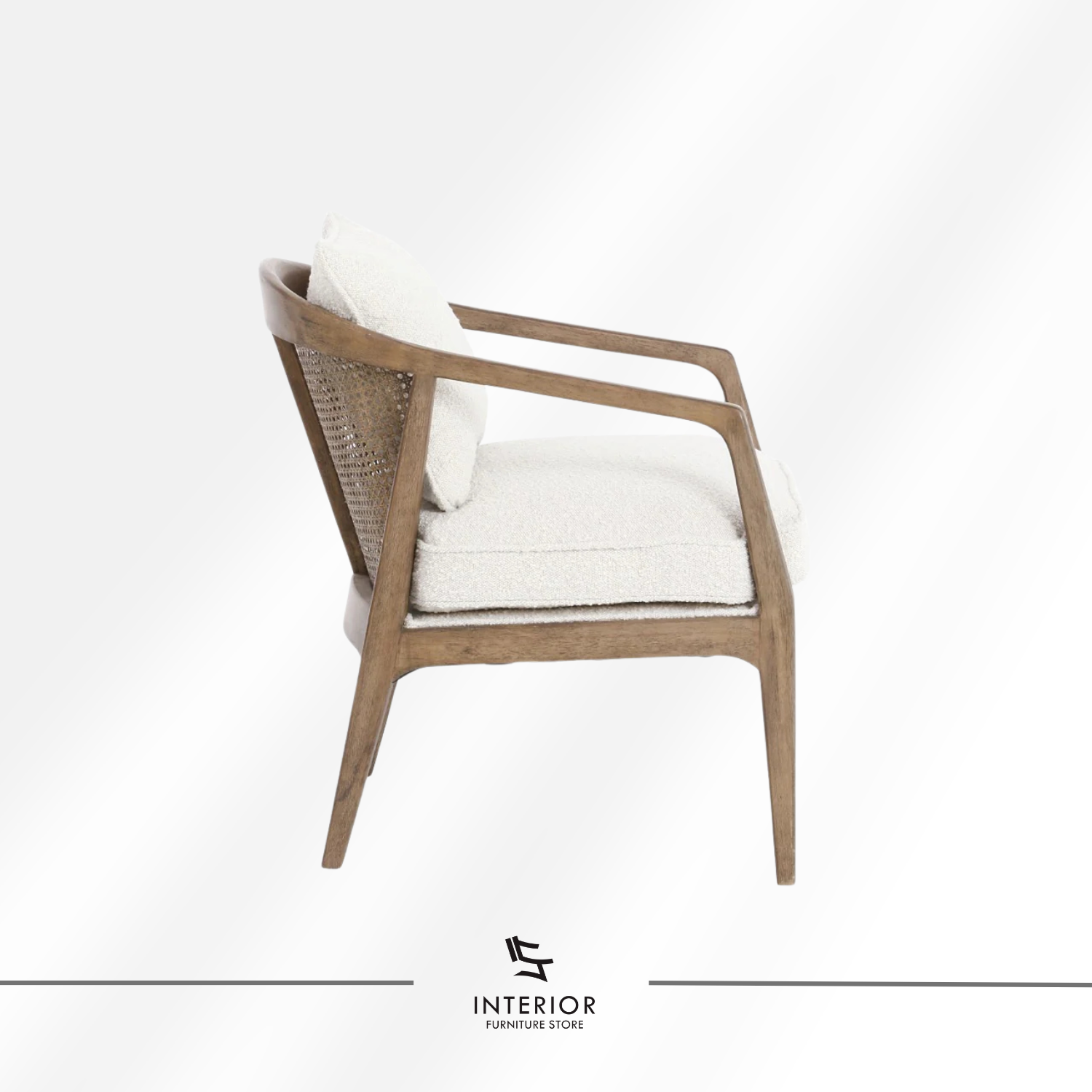 Kivantra cane lounge chair with bouclé upholstery and solid wood frame