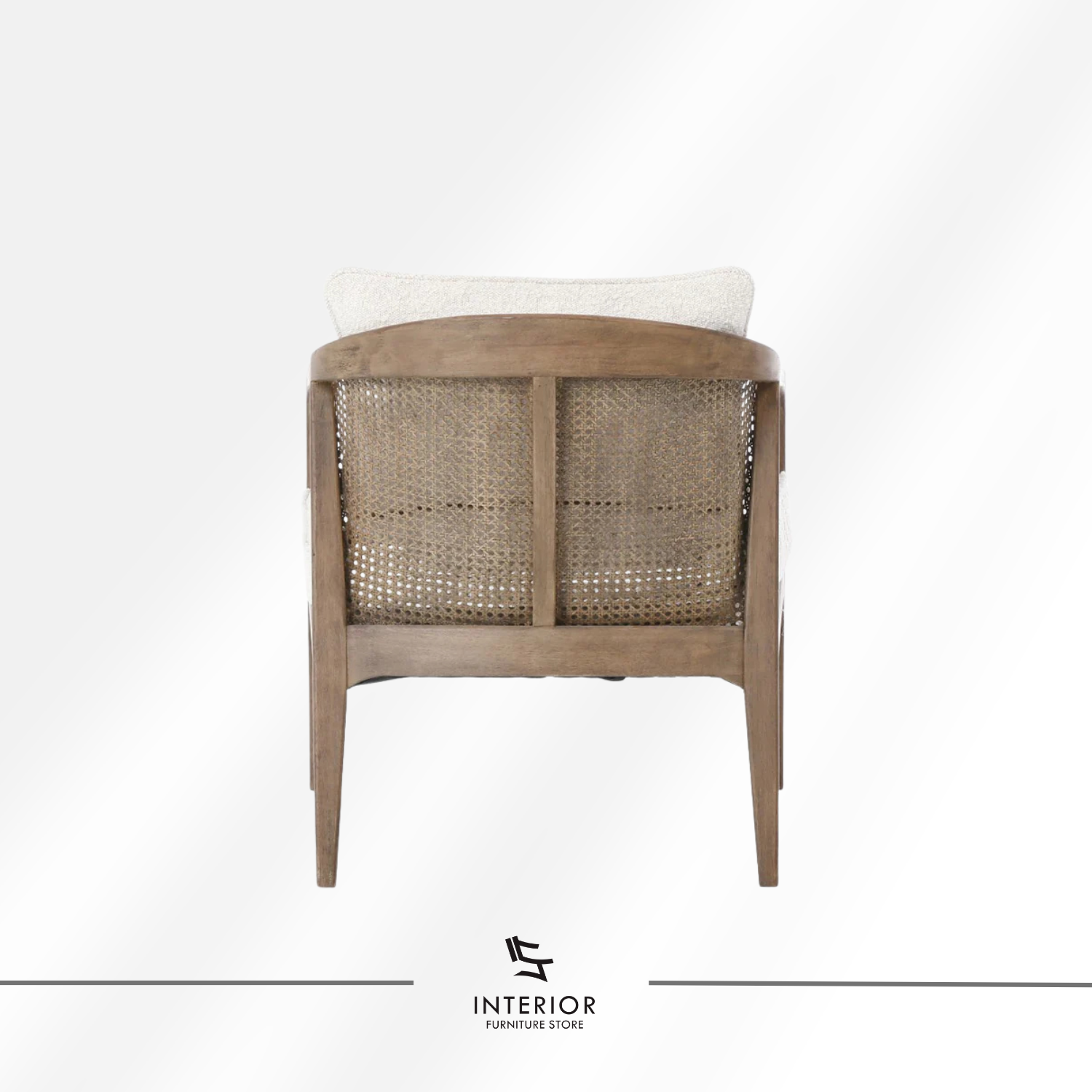Kivantra cane lounge chair with bouclé upholstery and solid wood frame
