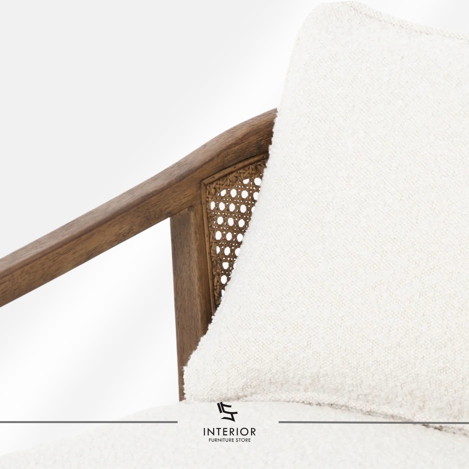 Kivantra cane lounge chair with bouclé upholstery and solid wood frame