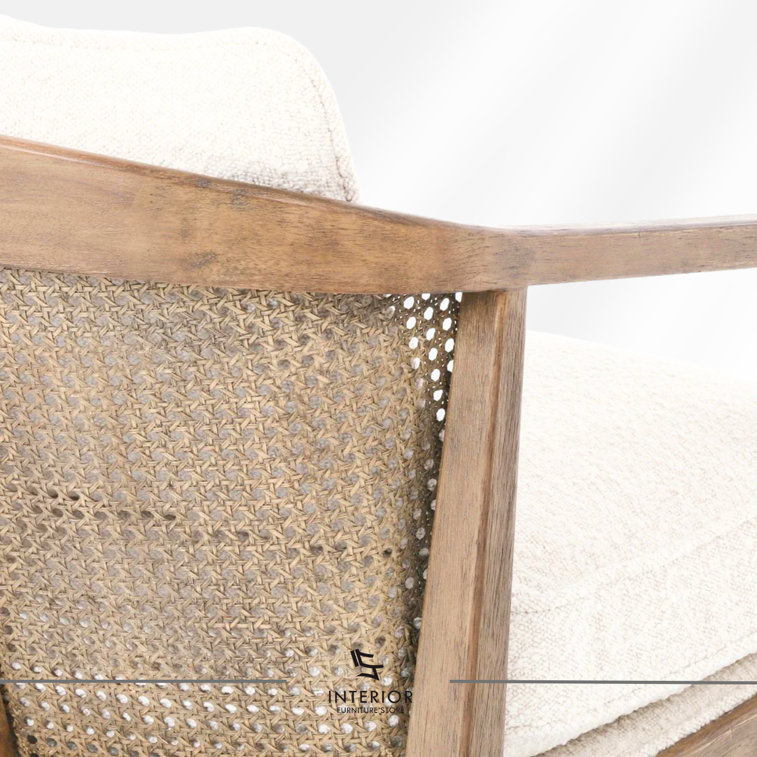 Kivantra cane lounge chair with bouclé upholstery and solid wood frame