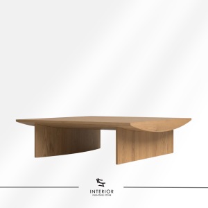 Kresna sculptural coffee table with geometric base and minimalist tabletop design