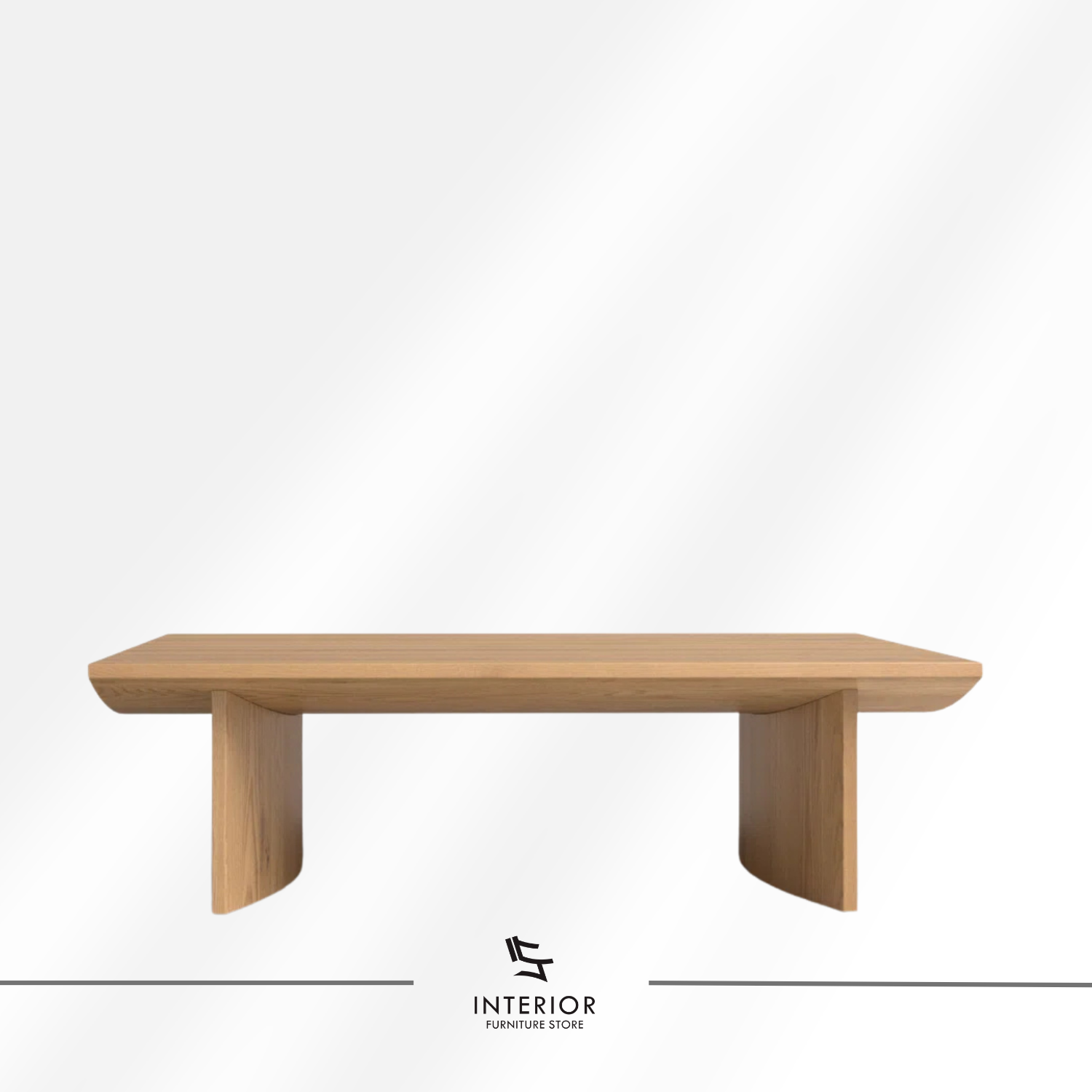 Kresna sculptural coffee table with geometric base and minimalist tabletop design