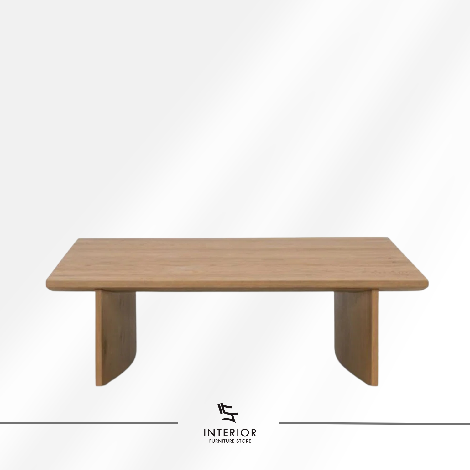 Kresna sculptural coffee table with geometric base and minimalist tabletop design