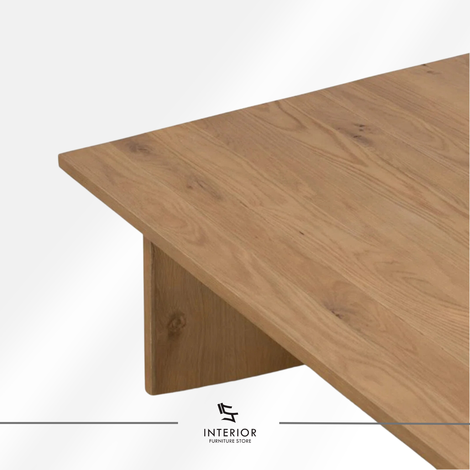 Kresna sculptural coffee table with geometric base and minimalist tabletop design
