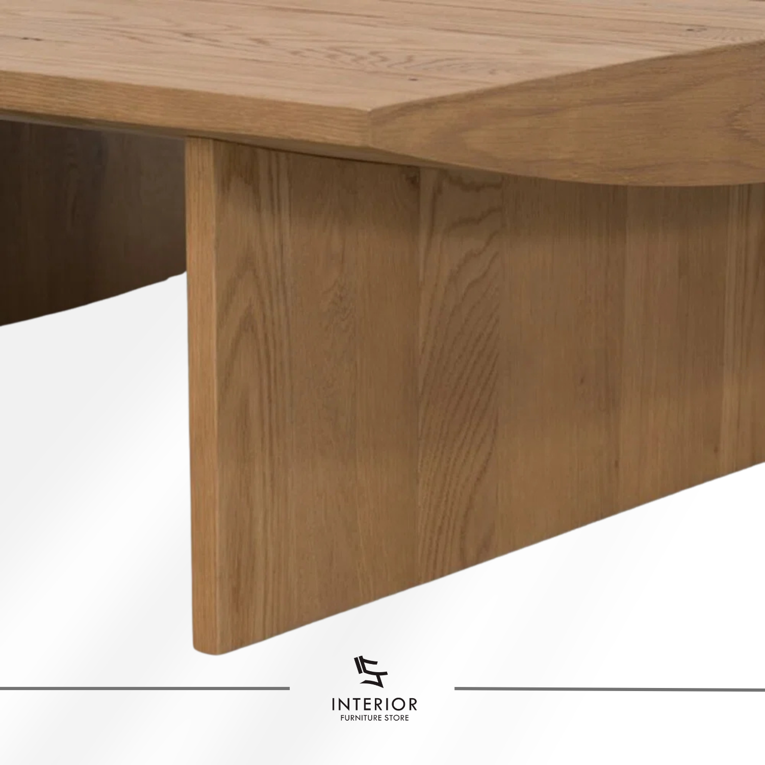 Kresna sculptural coffee table with geometric base and minimalist tabletop design
