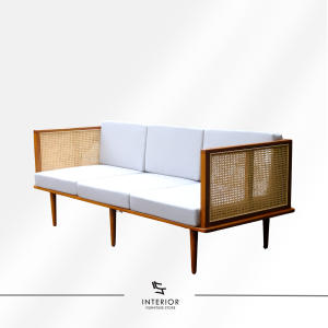 Nalina modern cane sofa with woven rattan side panels and minimalist wooden frame