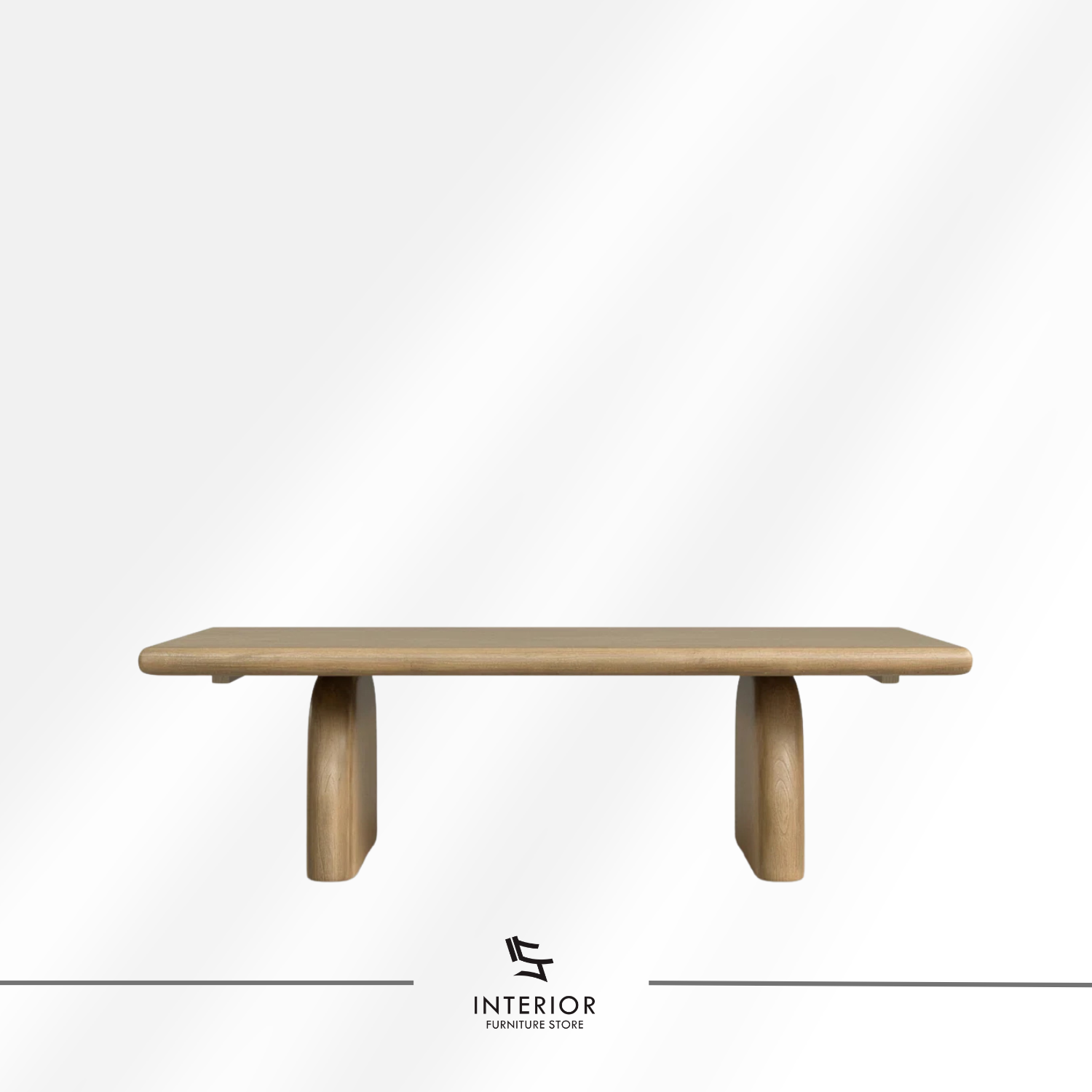 Tirana sculptural coffee table with curved pedestal base and minimalist design