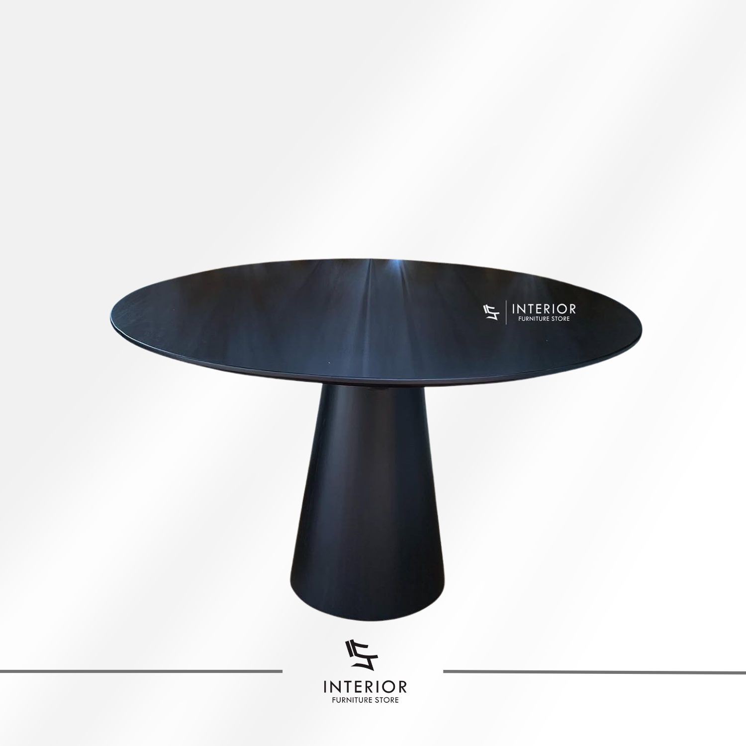 Padmanata round pedestal dining table crafted from solid wood with a black finish