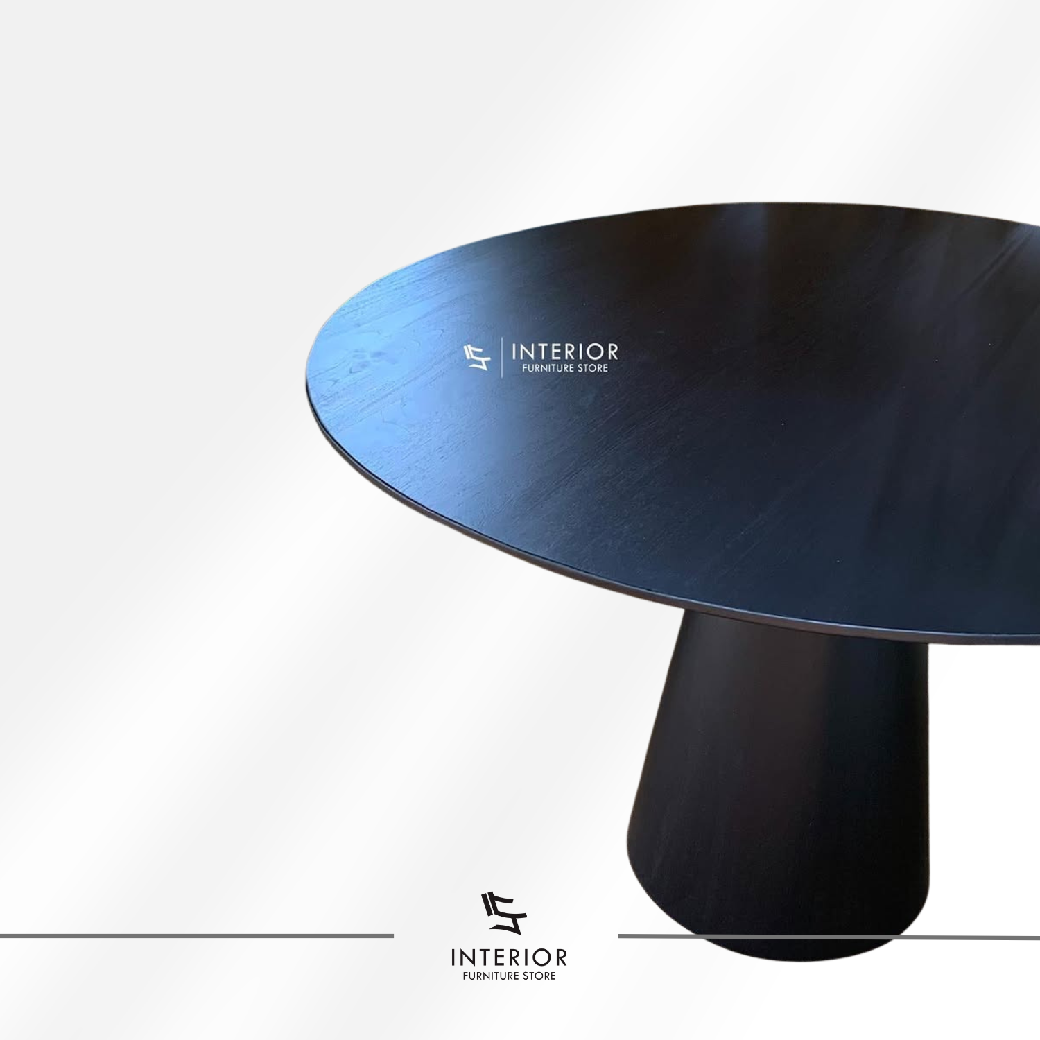 Padmanata round pedestal dining table crafted from solid wood with a black finish