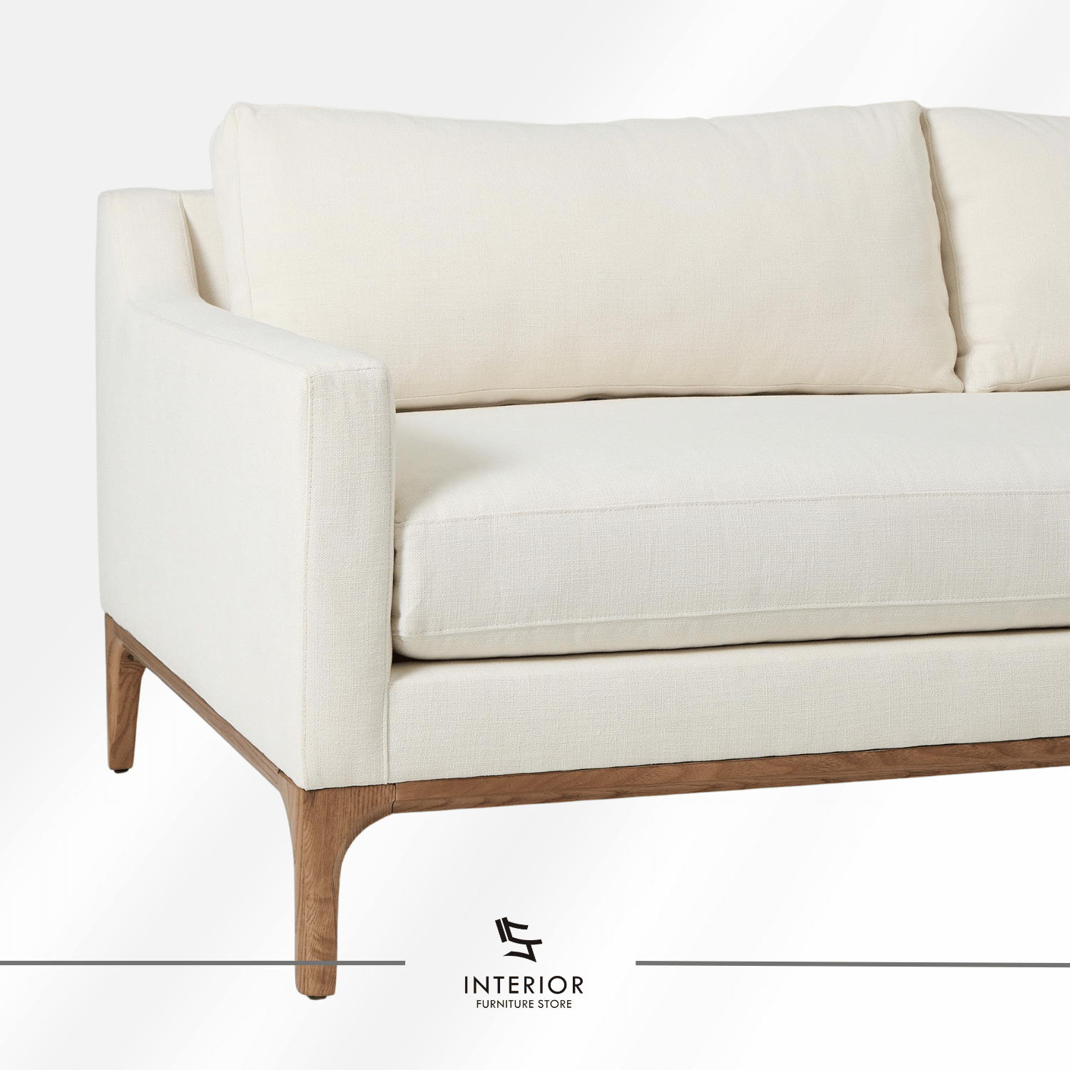 Calira modern upholstered sofa with soft cushions and natural wooden base